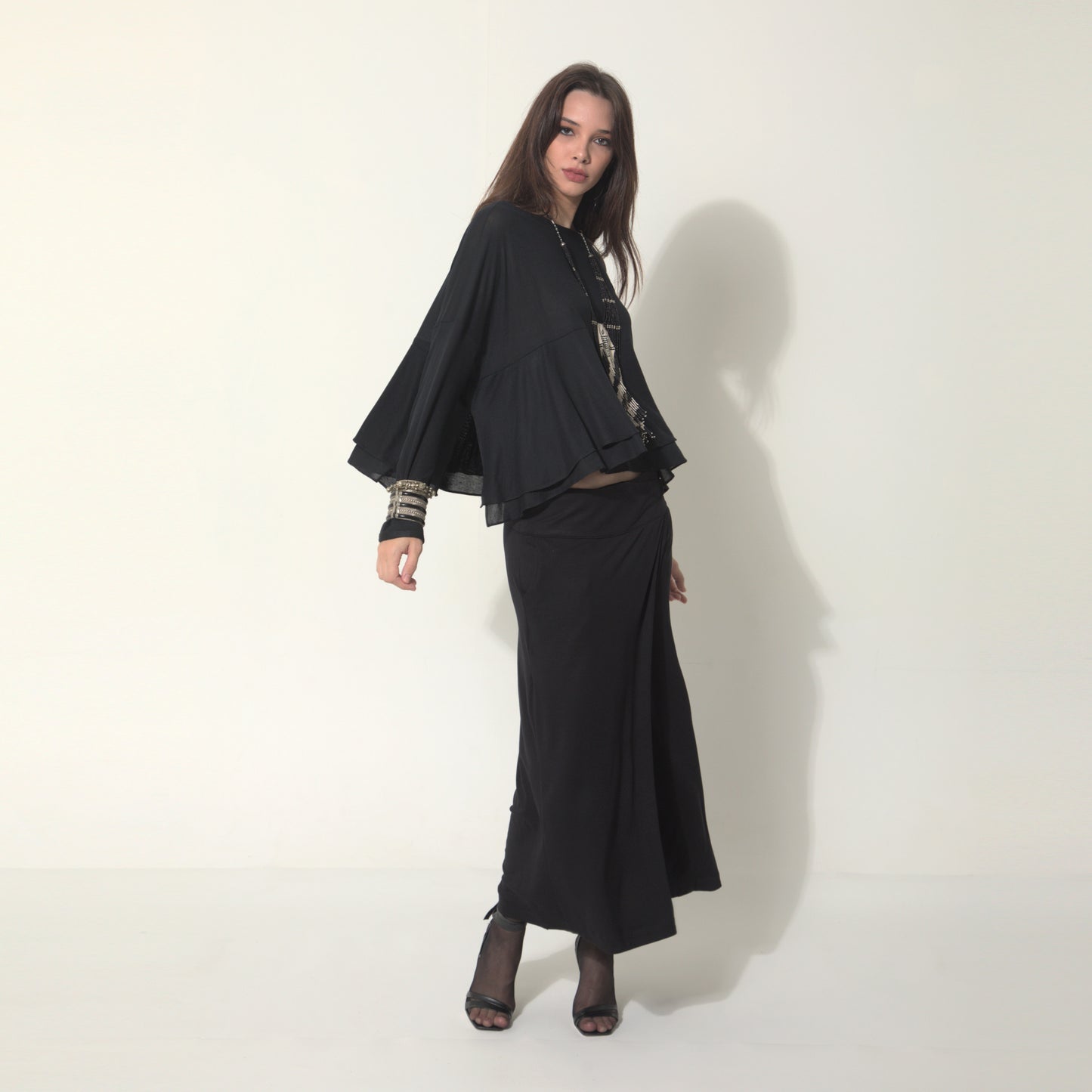 Sarah - Saia-calça de malha com ajuste de fivela de metal na cor preta