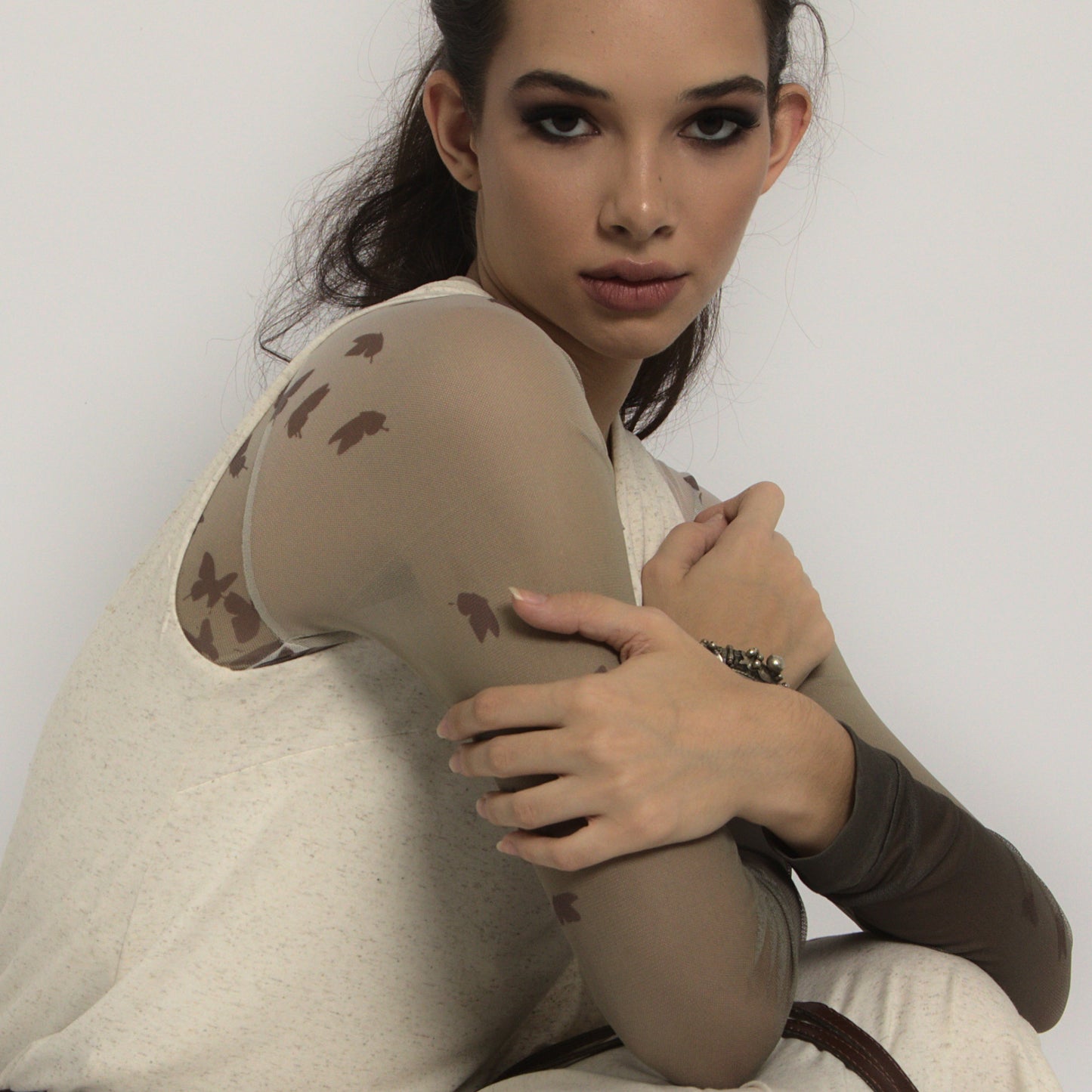 Olivia - Blusa transpassada sem mangas